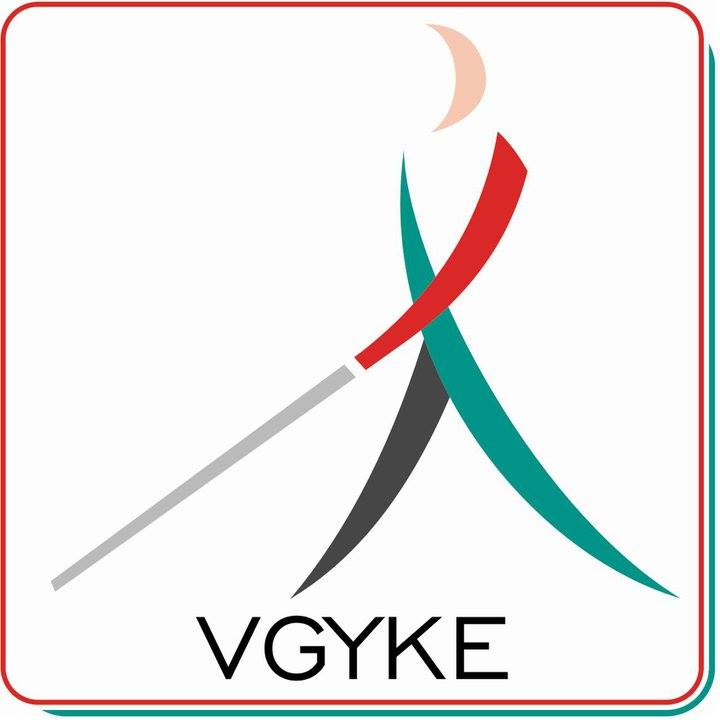 A képen a VGYKE logója látható. ogója, egy fehér botos emberke színes piktogramja piros keretben.